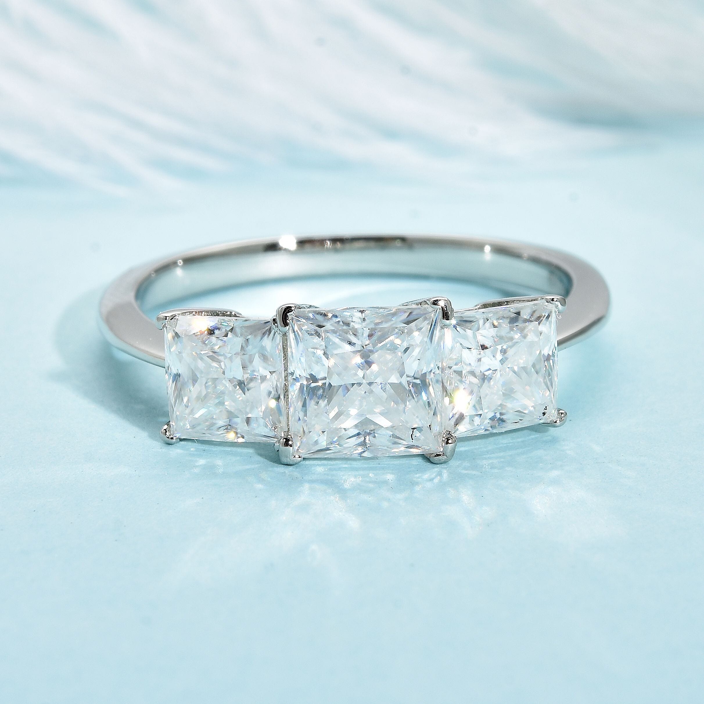 Moissanite Trilogy Ring in Rhodium Overlay Sterling Silver 2.00 Ct.